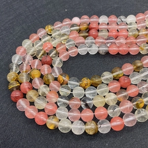 Detailed close-up of 6mm-10mm mixed natural gemstone round beads for DIY jewelry making
