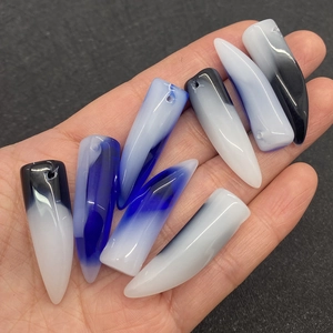 Handcrafted agate stone claw pendants in deep blue and black with pre-drilled holes
