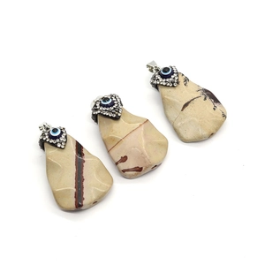 Irregular natural stone pendants with evil eye inlay and silver rhinestone claps