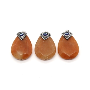 Orange drop-shaped natural stone pendant with evil eye and sparkling crystal charms