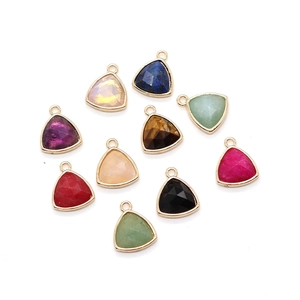 Triangular natural stone pendants with gold plating and multifaceted crystal cut designs