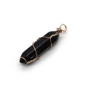 Blue goldstone hexagonal prism pendant with intricate gold wire wrapping details