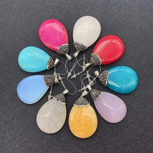 Polished teardrop stone pendants in 9 vibrant colors with silver rhinestone caps