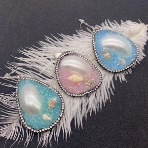 Irregular water-drop shell resin pendants in pink and blue with rhinestones