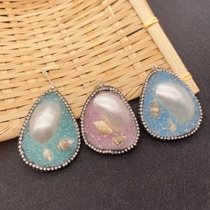 Handmade teardrop shell resin pendants with natural pearls and sparkling rhinestones