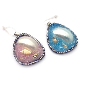 Natural shell resin teardrop pendants with rhinestone edges and sea-style charms