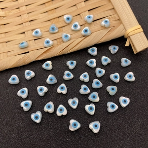 Natural heart shell beads with evil eye pattern for DIY jewelry and necklace making