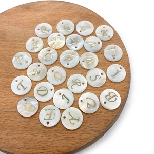 Natural freshwater shell round alphabet pendants with golden letter engraving for DIY jewelry