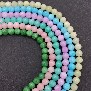Macro shot of colorful 6mm-10mm polished natural stone beads for DIY jewelry making
