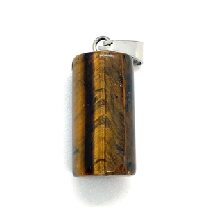 Macro shot of tiger eye stone cylinder pendant with metallic bail for DIY necklaces