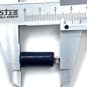 Macro shot of 26mm blue sandstone cylinder pendant measured with a digital caliper