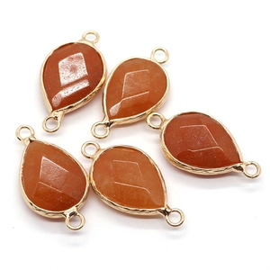 Faceted orange natural stone teardrop pendant with gold plated double loop connectors