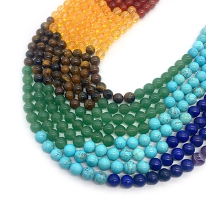 Vibrant macro view of colorful natural stone round beads for DIY jewelry making