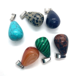 Teardrop gemstone pendants set with diverse stone patterns and silver metal clips