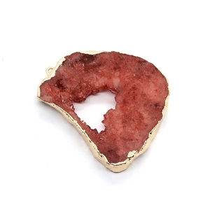 Irregular natural red crystal stone slice pendant with a gold plated metal edge