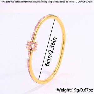 Detail showing inner diameter of 6cm for the gold titanium bangle with pink zircons