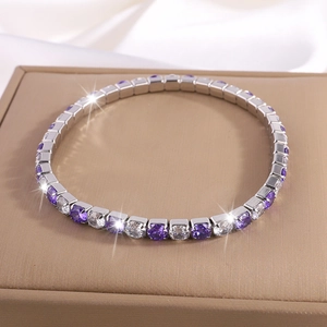 Elegante pulsera tennis de acero de titanio con circonitas púrpuras y blancas finas