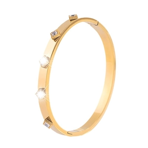 Bracelet luxe en acier titane doré avec zircons carrés et montures à bordure ciselée