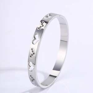 Vintage stainless steel hollow heart bracelet with small diamonds and silver finish