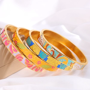 Luxury gold plated titanium steel bangles with colorful enamel floral patterns in a set of four