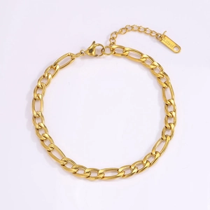 Detail view of gold Figaro chain bracelet with S.Steel tag and lobster clasp closure