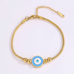 Detail of gold stainless steel snake chain bracelet with blue evil eye charm and clasp