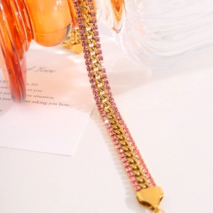 18K gold plated stainless steel Cuban link bracelet with sparkling pink zircon pavé setting