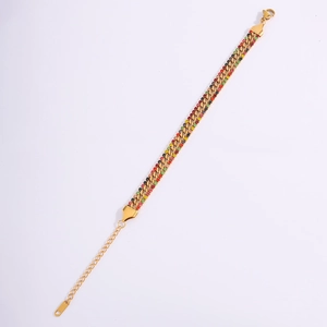 Close-up of triple-layered 18k gold plated bracelet with multicolored crystal inlay
