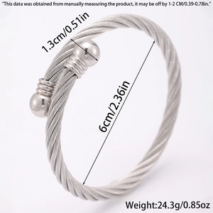 Détails du bracelet torsadé en fil d'acier montrant le diamètre 6cm et le poids