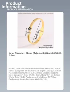 Detail showing gold clover bangle with Greek pattern and black and white enamel accents