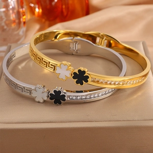 Clover couple bracelets in gold and silver finish with Greek fret patterns