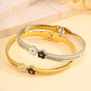 Titanium steel flower bangle set with Greek key patterns and inlaid crystal stones