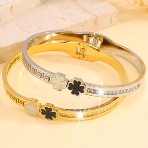 Luxurious gold and silver clover bracelets in polished stainless steel with rhinestones