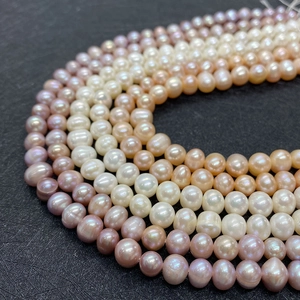 Natural 6-9mm freshwater pearl strands in white, pink, and lavender for DIY jewelry