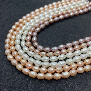 Natural AAA grade freshwater rice pearls in white, pink, and purple for DIY jewelry making