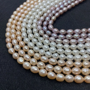 Natural freshwater rice pearls in white pink and purple colors for jewelry making
