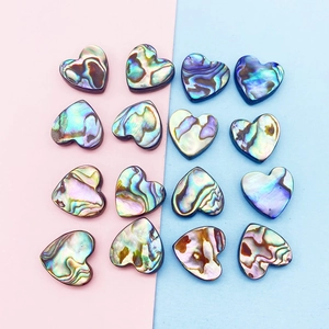 Natural heart-shaped abalone shell beads with iridescent rainbow colors for DIY jewelry