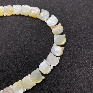 Natural sea shell cat head beads with iridescent luster for DIY jewelry making