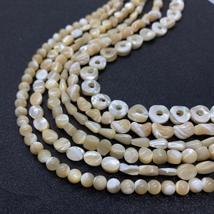 Perline di conchiglia naturale in bianco crema con lucentezza per gioielli fai da te