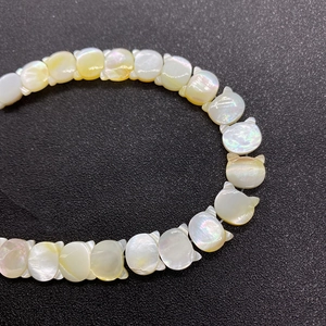 Cat-shaped natural mother of pearl beads for jewelry making in iridescent yellow white