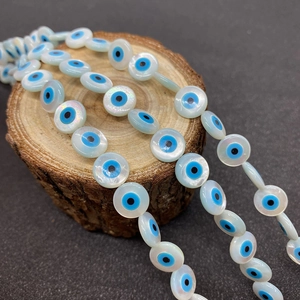 Natürliche Muschelperlen mit Evil Eye Muster für DIY Schmuck Halsketten und Armbänder