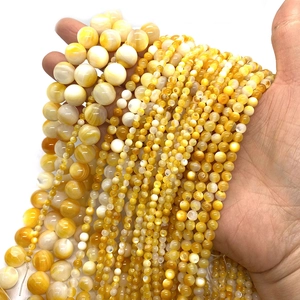 Natürliche gelbe Seemuschel-Rundperlen in verschiedenen Größen für DIY-Schmuck