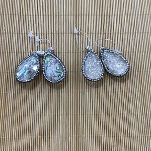 Waterdrop abalone shell and crystal rhinestone pendants with silver metal hooks on bamboo