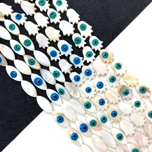 Hamsa hand and evil eye shaped mother of pearl shell beads for DIY jewelry making