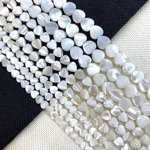 Natural white heart-shaped mother of pearl shell beads with iridescent luster for DIY jewelry