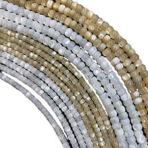 Natural white mop shell square beads in multiple strands with rainbow luster finish