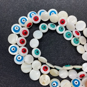 Flache runde Muschelperlen mit bunten bösen Blick Mustern für DIY Schmuck