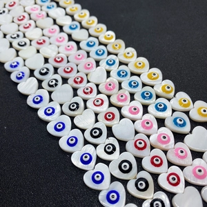 Natural heart shell beads with evil eye pattern for DIY jewelry and necklaces