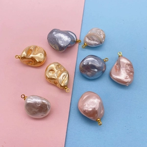 Irregular faux pearl pendants in champagne and blue with gold rings for DIY jewelry