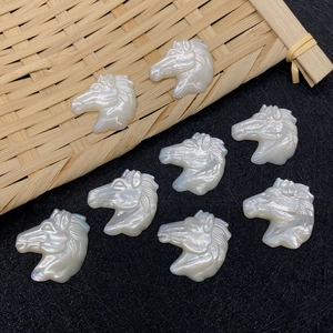 Set of eight carved white shell horse head pendants for DIY necklace jewelry making